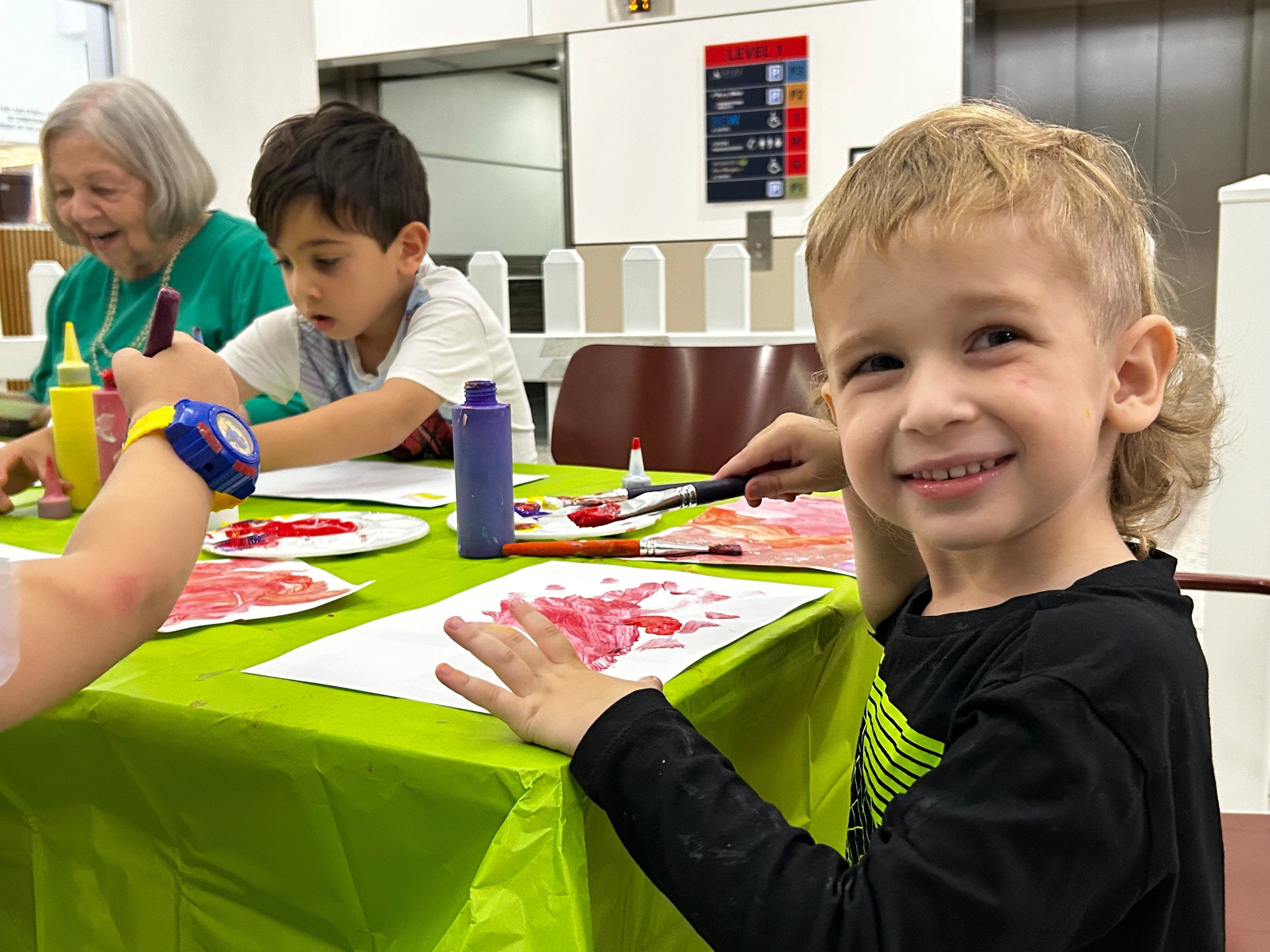 Intergenerational Marketown 180325 Julia and kids painting